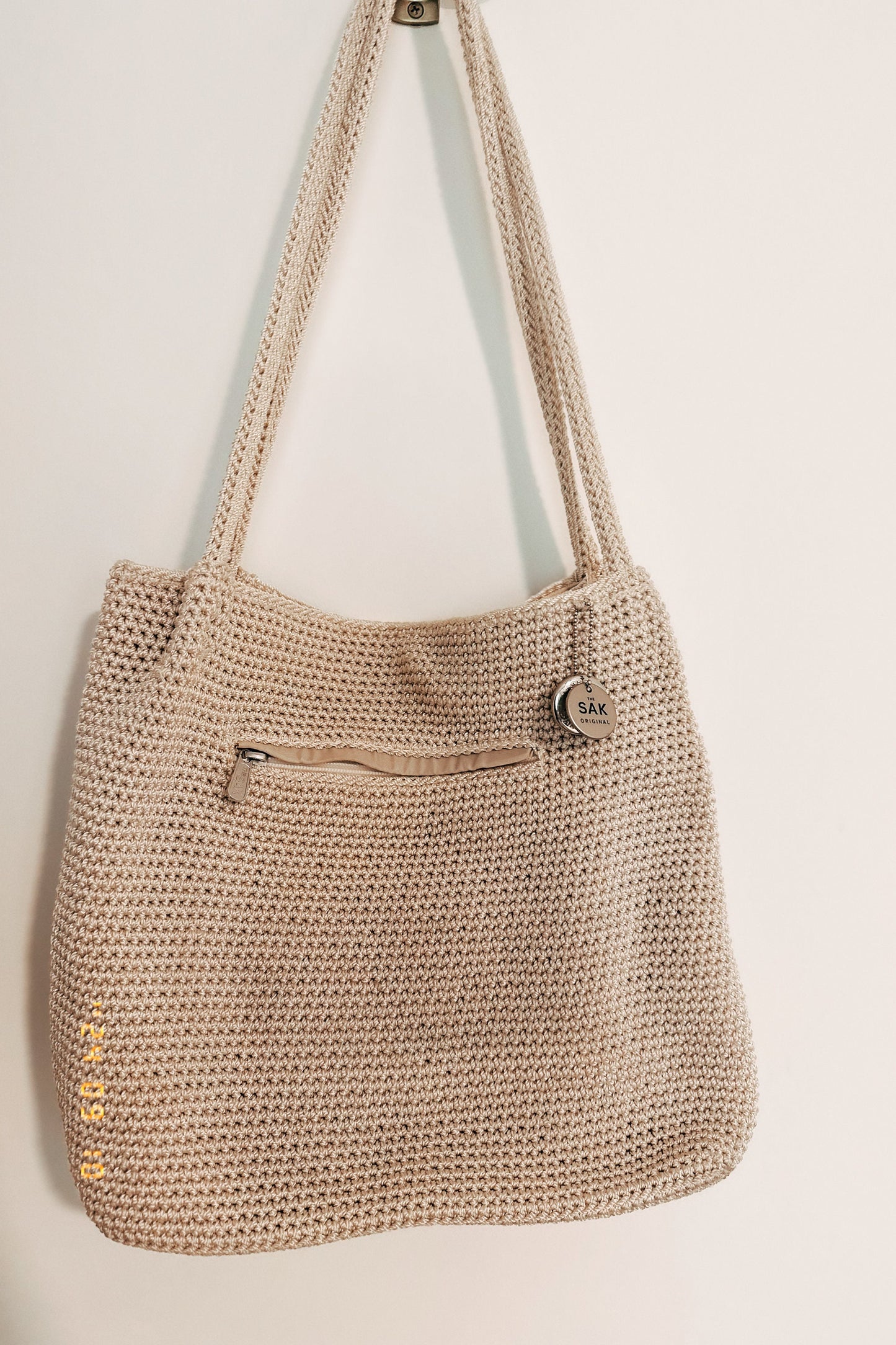 Cream crochet tote bag The Sak